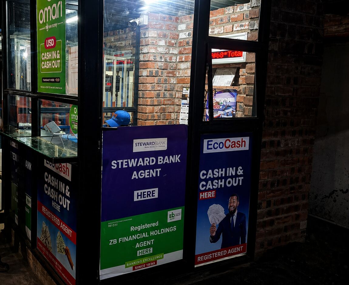 On-site mobile money booth with EcoCash, O'mari and Steward Bank cash-in/cash-out signage